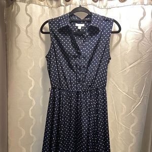 Sleeveless navy polka dot dress